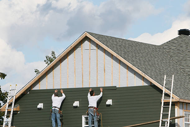Professional Siding Installation technician working in West College Corner, IN